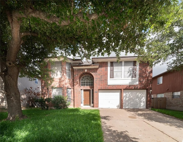 15406 Ecorio Dr, Austin, TX 78728 - view of front of property featuring brick siding, an attached garage, and driveway