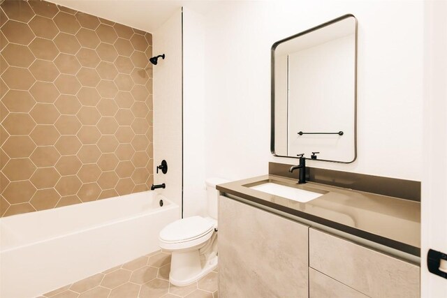 4315 S Congress Ave Unit 520, Austin, TX 78745 - full bathroom featuring toilet, vanity, tile patterned flooring, and  shower combination
