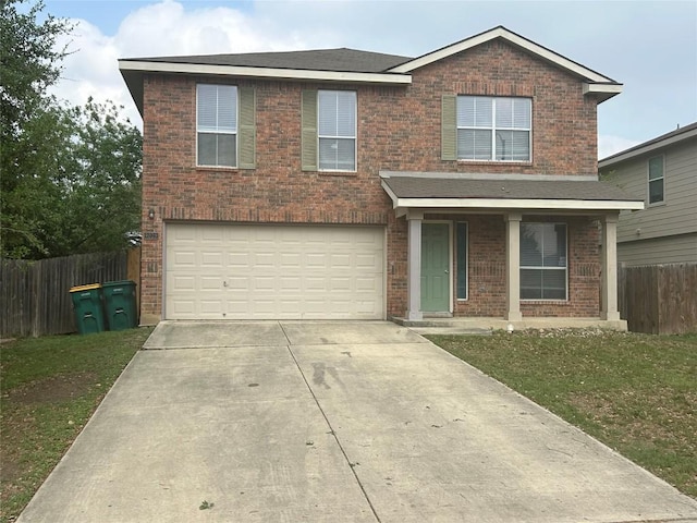 traditional home with driveway, a garage, fence, and brick siding