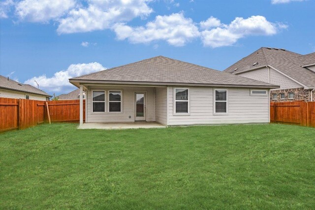 105 Saviano Rd, Hutto, TX 78634 - back of house featuring a patio and roof with shingles