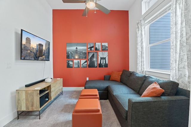 8922 Menchaca Rd Unit 204, Austin, TX 78748 - carpeted living room featuring ceiling fan, baseboards, and healthy amount of natural light