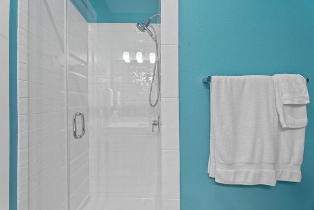 bathroom featuring a stall shower