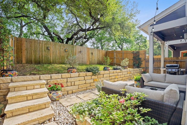 8922 Menchaca Rd Unit 204, Austin, TX 78748 - fenced backyard with outdoor lounge area and a grill