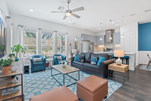 8922 Menchaca Rd Unit 204, Austin, TX 78748 - living area with dark wood-style flooring, a ceiling fan, recessed lighting, and baseboards