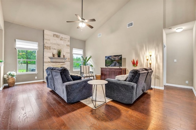 18003 Linkhill Dr, Dripping Springs, TX 78620 - living room featuring a ceiling fan, healthy amount of natural light, dark wood-type flooring, high vaulted ceiling, and baseboards