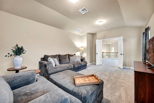 18003 Linkhill Dr, Dripping Springs, TX 78620 - living area featuring light colored carpet, lofted ceiling, and baseboards