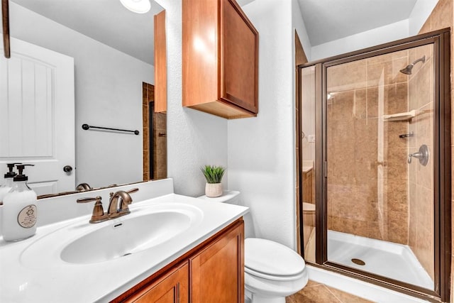 18003 Linkhill Dr, Dripping Springs, TX 78620 - bathroom with toilet, a stall shower, and vanity