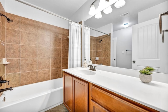 18003 Linkhill Dr, Dripping Springs, TX 78620 - full bathroom with vanity, shower / bath combination with curtain, and tile patterned floors