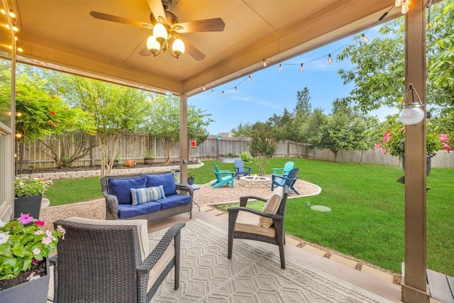 18003 Linkhill Dr, Dripping Springs, TX 78620 - view of patio featuring ceiling fan and an outdoor living space with a fire pit