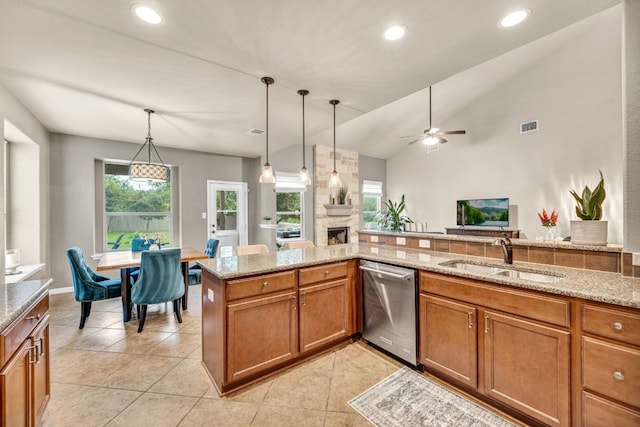 18003 Linkhill Dr, Dripping Springs, TX 78620 - kitchen with dishwasher, a sink, open floor plan, light stone counters, and a ceiling fan