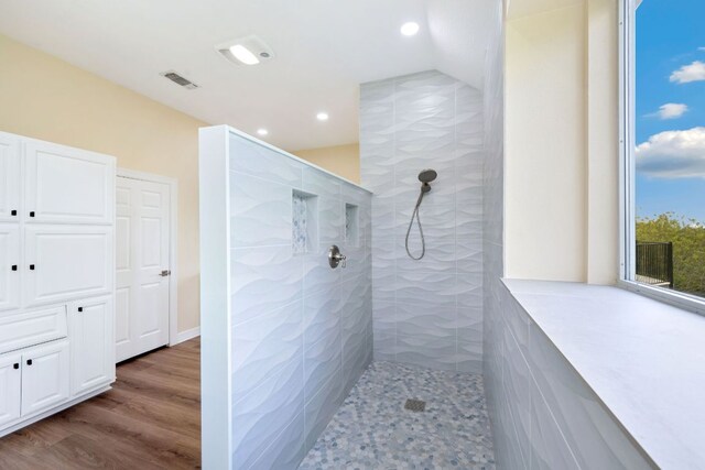 8316 Talbot Ln, Austin, TX 78746 - full bath with a walk in shower, recessed lighting, and wood finished floors