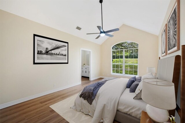 8316 Talbot Ln, Austin, TX 78746 - bedroom featuring light wood-style flooring, lofted ceiling, baseboards, a ceiling fan, and ensuite bath