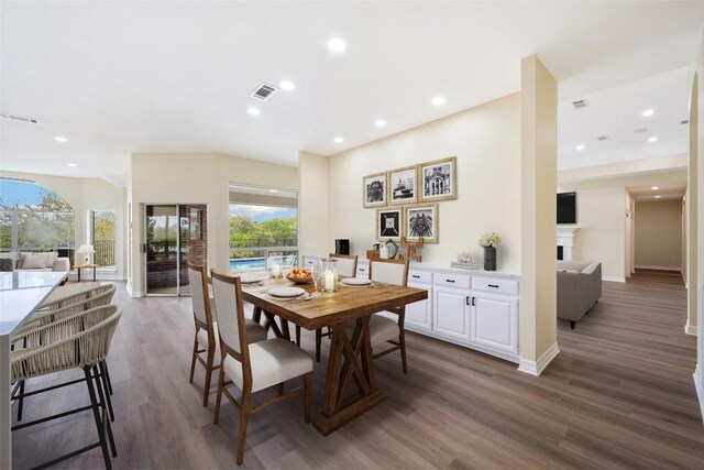 8316 Talbot Ln, Austin, TX 78746 - dining room featuring healthy amount of natural light, wood finished floors, recessed lighting, and baseboards