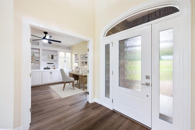 8316 Talbot Ln, Austin, TX 78746 - entrance foyer with dark wood finished floors, a ceiling fan, and baseboards