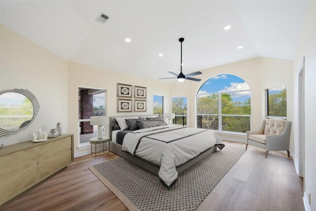 8316 Talbot Ln, Austin, TX 78746 - bedroom with vaulted ceiling, light wood finished floors, a ceiling fan, and recessed lighting