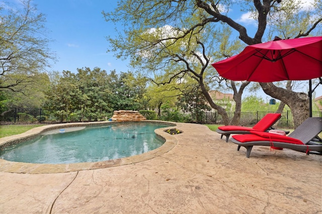 view of pool with fence, a patio area, and a fenced in pool