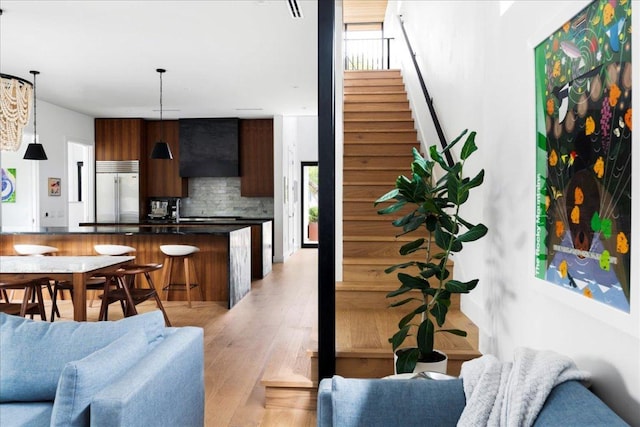 3313 Bonnie Rd, Austin, TX 78703 - living area featuring light wood finished floors and stairway
