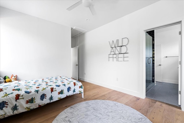3313 Bonnie Rd, Austin, TX 78703 - bedroom featuring attic access, baseboards, wood finished floors, and ceiling fan