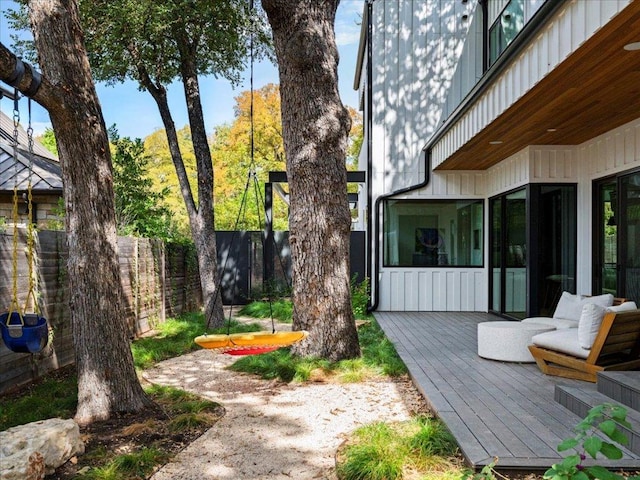view of yard featuring a fenced backyard and a wooden deck