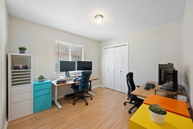 5216 Trading Bnd, Austin, TX 78735 - home office with light wood-style floors and baseboards