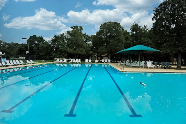 5216 Trading Bnd, Austin, TX 78735 - community pool featuring view of scattered trees and a patio