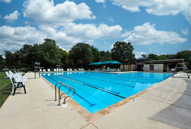 5216 Trading Bnd, Austin, TX 78735 - community pool with a patio