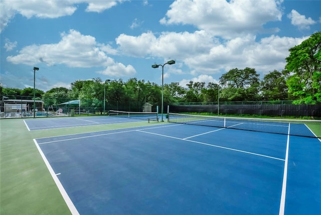 5216 Trading Bnd, Austin, TX 78735 - view of tennis court featuring community basketball court and view of scattered trees