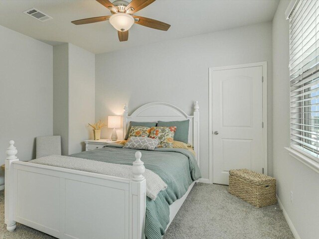 2733 Painted Sky Bnd, Leander, TX 78641 - bedroom with light carpet and ceiling fan