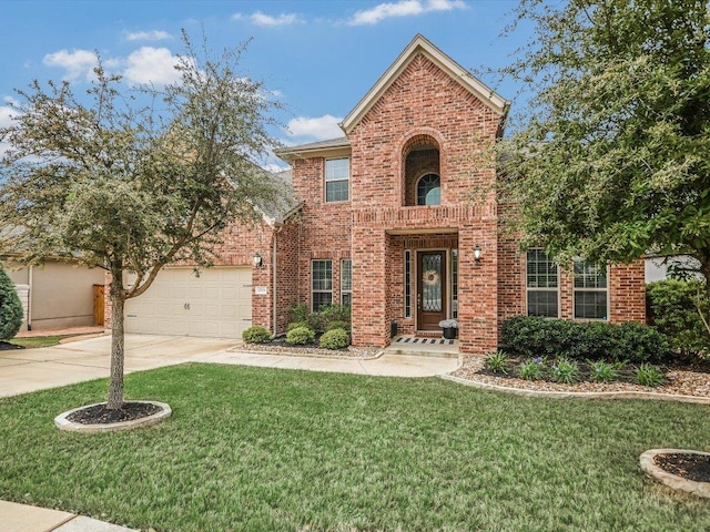 2733 Painted Sky Bnd, Leander, TX 78641 - traditional-style home featuring concrete driveway, a front yard, brick siding, and a garage