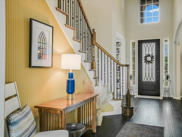 2733 Painted Sky Bnd, Leander, TX 78641 - entryway with hardwood / wood-style flooring, stairway, and a towering ceiling