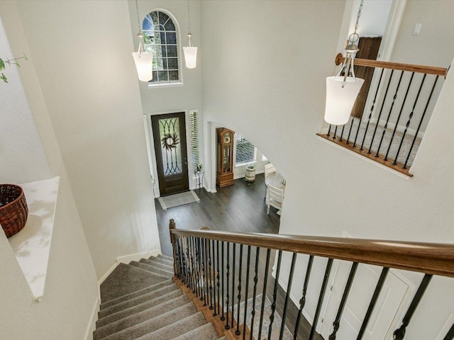 2733 Painted Sky Bnd, Leander, TX 78641 - foyer featuring wood finished floors, stairs, and a high ceiling