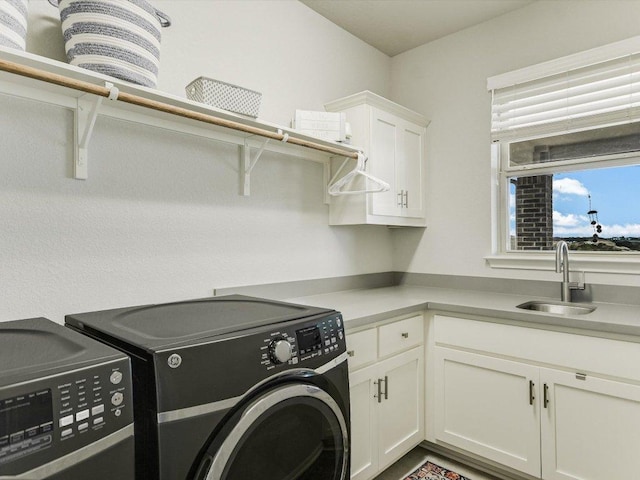 2733 Painted Sky Bnd, Leander, TX 78641 - washroom featuring cabinet space and washing machine and dryer
