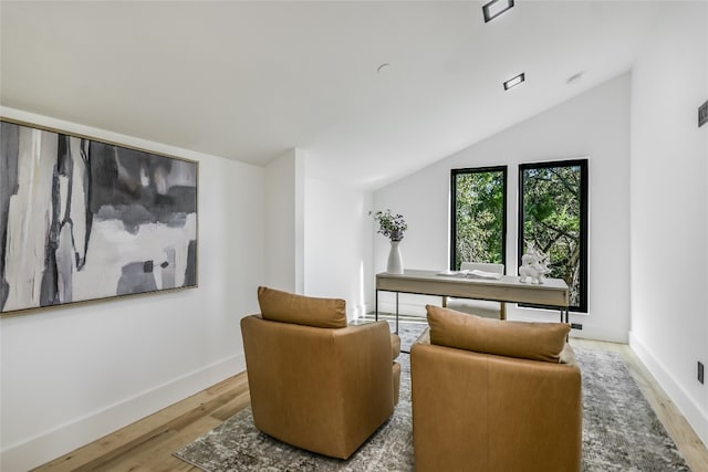 1903 Toro Canyon Rd, Austin, TX 78746 - sitting room featuring lofted ceiling and wood finished floors
