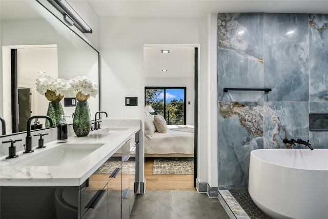 1903 Toro Canyon Rd, Austin, TX 78746 - ensuite bathroom with a soaking tub and double vanity
