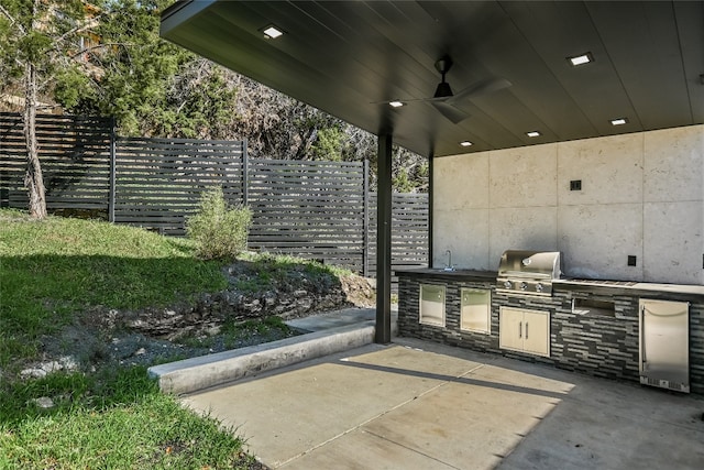 1903 Toro Canyon Rd, Austin, TX 78746 - view of patio with an outdoor kitchen and ceiling fan