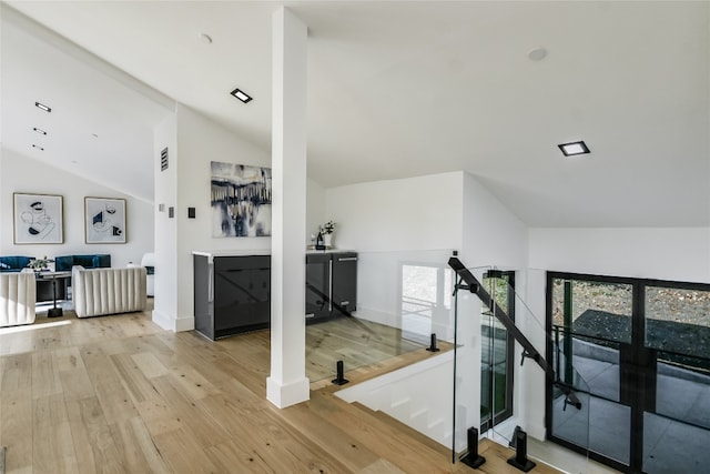 1903 Toro Canyon Rd, Austin, TX 78746 - corridor featuring an upstairs landing, lofted ceiling, and wood finished floors