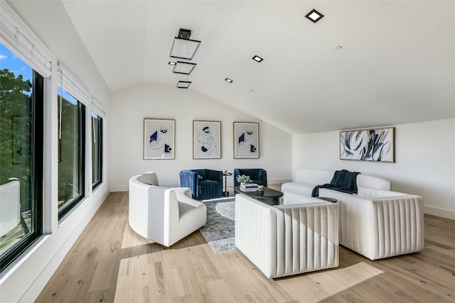 1903 Toro Canyon Rd, Austin, TX 78746 - living area featuring vaulted ceiling and light wood finished floors