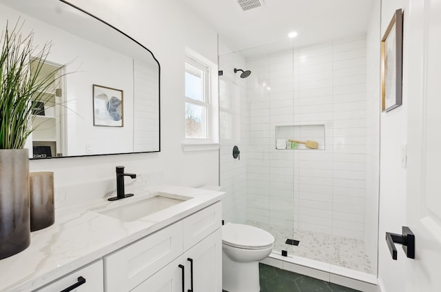 6014 London Dr, Austin, TX 78745 - bathroom with a stall shower, toilet, vanity, and tile patterned flooring