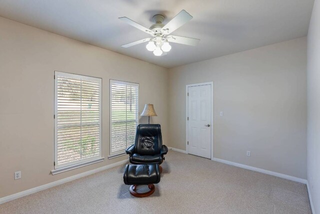 21507 Lakefront Dr, Lago Vista, TX 78645 - sitting room with a ceiling fan, carpet, and baseboards