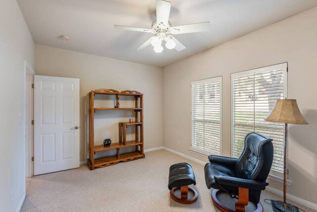21507 Lakefront Dr, Lago Vista, TX 78645 - sitting room featuring ceiling fan, carpet flooring, and baseboards