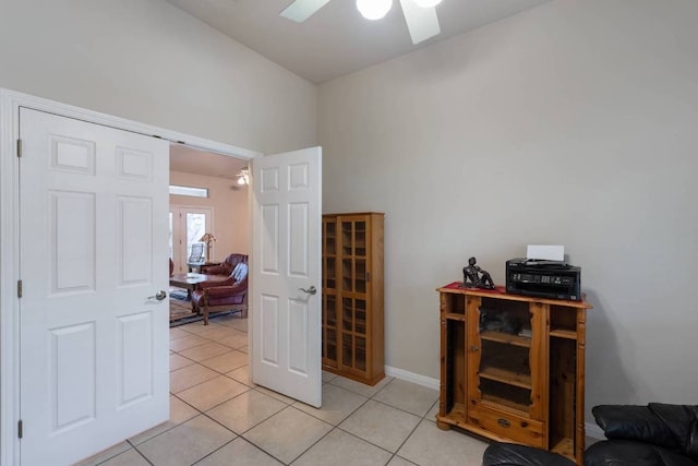 21507 Lakefront Dr, Lago Vista, TX 78645 - office with ceiling fan, light tile patterned floors, and baseboards