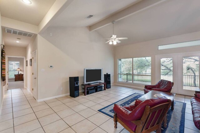21507 Lakefront Dr, Lago Vista, TX 78645 - living room with light tile patterned flooring, healthy amount of natural light, ceiling fan, and baseboards