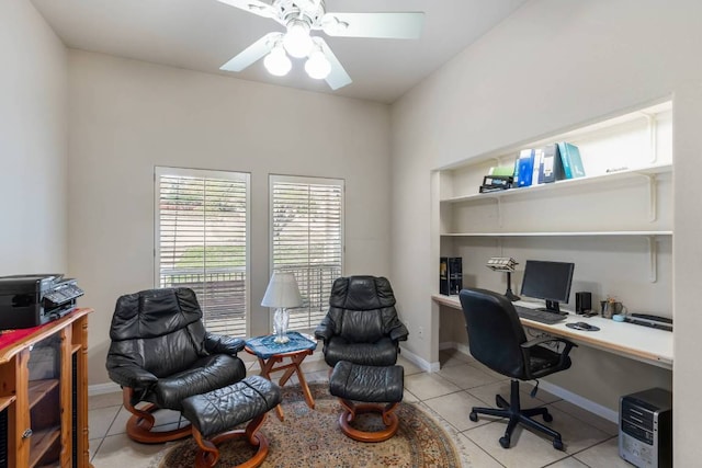 21507 Lakefront Dr, Lago Vista, TX 78645 - office with light tile patterned floors, ceiling fan, and baseboards