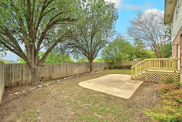 13401 Lamplight Village Ave, Austin, TX 78727 - fenced backyard with a patio area and a wooden deck