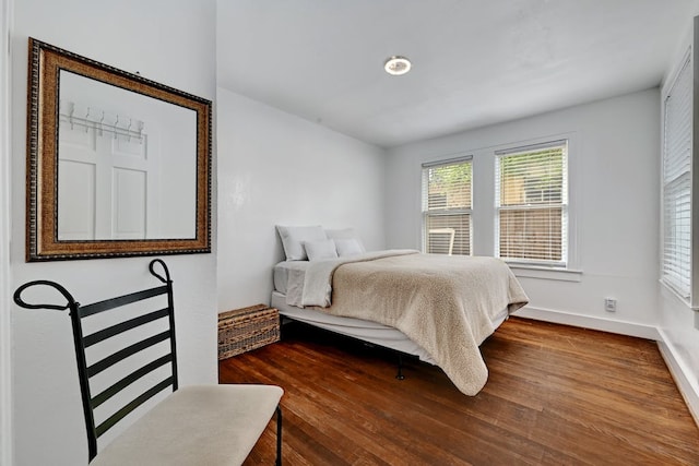 5313 Martin Ave, Austin, TX 78751 - bedroom featuring wood finished floors and baseboards