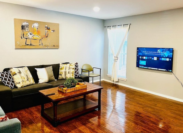6501 E Hill Dr Unit 105, Austin, TX 78731 - living area with hardwood / wood-style flooring and baseboards