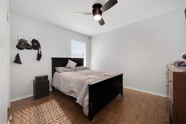 12404 Granton Cv, Austin, TX 78754 - bedroom featuring ceiling fan, baseboards, and dark wood-style flooring