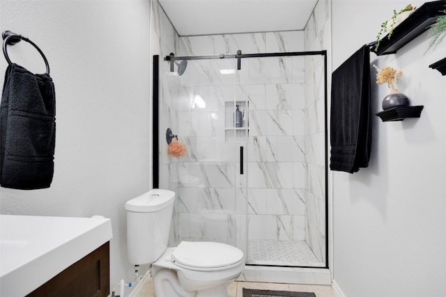 12404 Granton Cv, Austin, TX 78754 - full bath featuring toilet, vanity, a marble finish shower, and baseboards