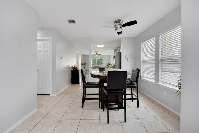 12404 Granton Cv, Austin, TX 78754 - dining area featuring ceiling fan, baseboards, visible vents, and light tile patterned floors