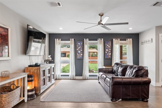 1241 Lake Terrace Dr, Elgin, TX 78621 - living area featuring visible vents, ceiling fan, and wood finished floors